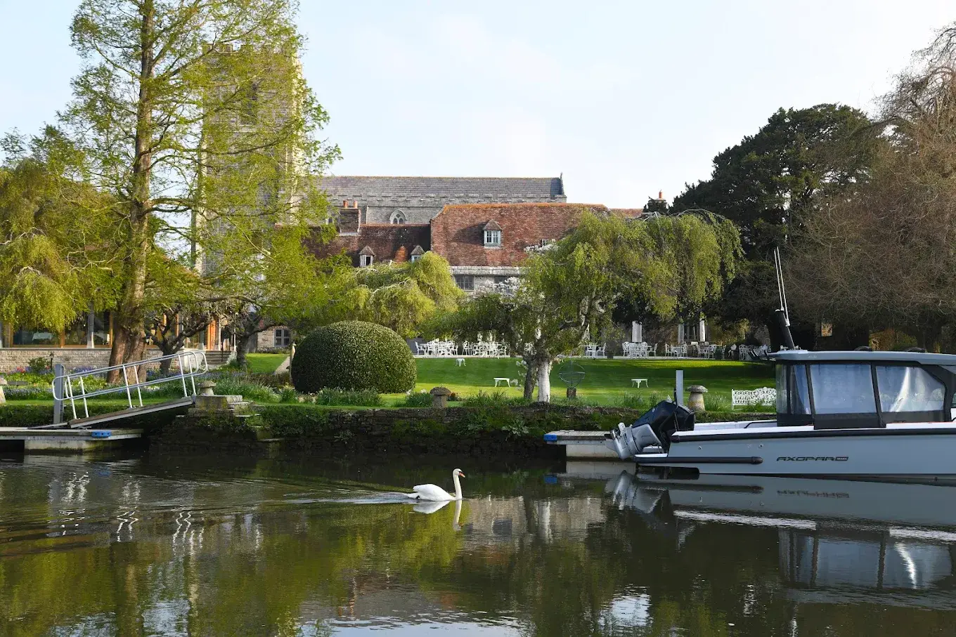 hotel gardens near river frome
